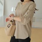 Faux-pearl Sleeve Button-back Blouse