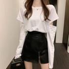 Cut-out Long-sleeve T-shirt / Mini A-line Skirt