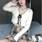 Long-sleeve Lace-up Top / Plain Camisole Top / Plaid Mini Skirt