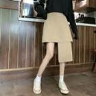 Long-sleeve Cutout T-shirt / Irregular A-line Skirt
