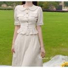 Short-sleeve Peplum Blouse / A-line Midi Skirt / Set