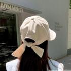 Tied Back Cap