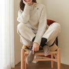 Buttoned High-neck Slit-side Sweater