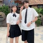 Couple Matching Pocket Detail Short-sleeve T-shirt / Bow Tie / Tie / Mini Pleated Skirt / Shorts / Set
