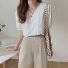 Puff-sleeve Asymmetrical Buttoned Blouse