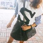 Set: Lettering Knit Top + Asymmetric Stripe Shirt + Faux-leather Mini Skirt