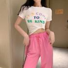 Lettering Short-sleeve T-shirt / Drawstring Cropped Harem Pants