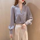Long-sleeve Faux Pearl V-neck Blouse