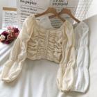 Long-sleeve Buttoned Ruched Blouse