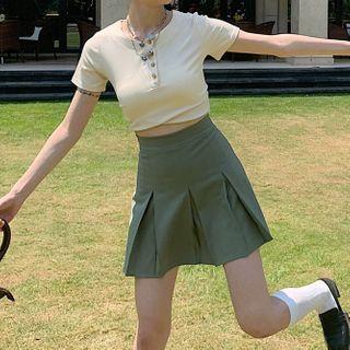 Cropped T-shirt / Mini Pleated Skirt