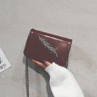 Feather Accent Patent Crossbody Bag