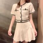 Set: Short-sleeve Contrast Trim Buttoned Top + Pleated A-line Mini Skirt