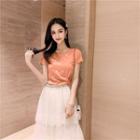 Short-sleeve Glitter T-shirt / High-waist Layered Pleated Skirt