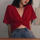 Deep V-neck Short-sleeve Knotted Cropped Blouse Red - One Size