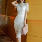 Set: Short-sleeve Perforated Lace Top + Midi Fitted Skirt