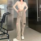 Long-sleeve Zip-up Top / Cut-out Wide-leg Pants