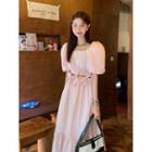 Puff-sleeve Bow-accent Cutout Midi A-line Dress