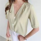 Plunge-neck Buttoned Blouse