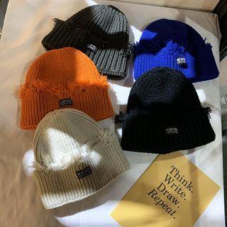 Distressed Label Tag Knit Beanie