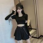 Long-sleeve Cropped T-shirt / Pleated A-line Skirt