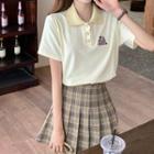 Short-sleeve Embroidered Polo Shirt / Pleated Skirt