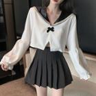Puff-sleeve Blouse / Pleated Mini Skirt