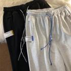 Buttoned Hem Sweatpants