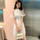 Short-sleeve Cold Shoulder Feathered A-line Dress