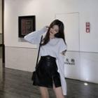 Cut Out Long-sleeve T-shirt / Faux Leather A-line Skirt
