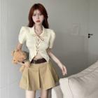 Lace-up Cropped T-shirt / Pleated Mini A-line Skirt