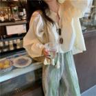 Puff-sleeve Blouse / Printed Pants