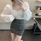 Puff-sleeve Blouse / Patterned Mini Skirt