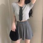 Short-sleeve Tie Neck Knit Top + Pleated Shorts