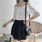 Set: Plain Off Shoulder Elbow Sleeve Blouse + Striped Skort