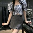 Puff-sleeve Flower Print Cropped Blouse / Mini Pleated Skirt