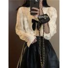 V-neck Bow Blouse / Faux Leather Mini A-line Skirt