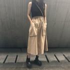Sleeveless Mock-neck Knit Top / Dual-pocket A-line Midi Skirt