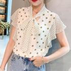 Ruffle Dotted Sleeveless Top