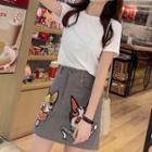 Set: Short-sleeve T-shirt + Embroidered A-line Mini Skirt