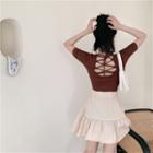 Lace-up Short-sleeve Slim-fit Top / High-waist A-line Skirt