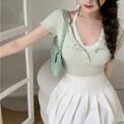 Short-sleeve Knit Top / Mini A-line Pleated Skirt