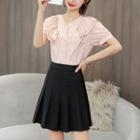 Set: Ruffle Short-sleeve Blouse + High-waist Mini Pleated Skirt