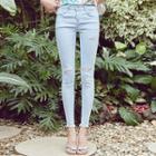 Fray-hem Destressed Skinny Jeans