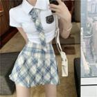 Tie-neck Short-sleeve Polo Shirt / Plaid Pleated Mini A-line Skirt