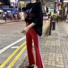 Lettering Print Elbow-sleeve T-shirt / Striped Side Bell Bottom Pants