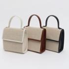 Piped Rattan Flap Satchel