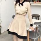 Set: Color Block Long-sleeve Knit Top + High Waist A-line Knit Skirt As Shown In Figure - One Size
