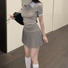 Short-sleeve Knit Polo Shirt / High Waist Pleated Skirt