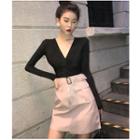 V-neck Long-sleeve T-shirt / Faux-leather A-line Skirt