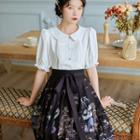 Set: Short-sleeve Lace Panel Blouse + Cat Print A-line Skirt